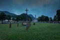 Lourdes, France, 24 June 2019: Evening procession with candles at the shrine of Lourdes Royalty Free Stock Photo