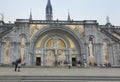 Lourdes, France, 24 June 2019: Front of the richly decorated entrance to the Rosary Basilica in Lourdest Royalty Free Stock Photo