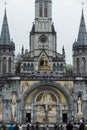 Lourdes, France, 24 June 2019: Front of the richly decorated entrance to the Rosary Basilica in Lourdest Royalty Free Stock Photo