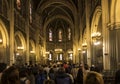 Lourdes, France, 24 June 2019: Interior of the upper basilica of the Immaculate Conception in Lourdes during a liturgical service