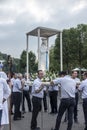 Lourdes, France June 24, 2019: Preparation for going out to the evening rosary procession at the Marian shrine in Lourdes Royalty Free Stock Photo