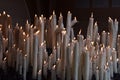 Candles glow at a shrine within the Rosary Basilica of Lourdes catholic pilgrimage site Royalty Free Stock Photo