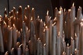 Candles glow at a shrine within the Rosary Basilica of Lourdes catholic pilgrimage site Royalty Free Stock Photo