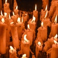 Candles glow at a shrine within the Rosary Basilica of Lourdes catholic pilgrimage site Royalty Free Stock Photo