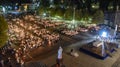 Pilgrims attend the Marian Torchlight Procession service at the Rosary Basilica in Lourdes Royalty Free Stock Photo