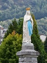 Statue of the Virgin Mary on the espanade of the Rosary Basilica