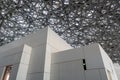 The Louvre Abu Dhabi, amazing interior picture of the white walls and beautiful ceiling structure. Place for Museums, galleries Royalty Free Stock Photo