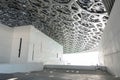 The Louvre Abu Dhabi, interior picture of the walls and beautiful ceiling structure. Place for Museums, galleries, exhibitions in