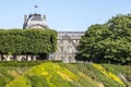 Louvre museum as seen from Jardin des Tuileries in Paris