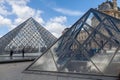 Louvre Museum with Glass Pyramids, Famous Landmark in Paris France Royalty Free Stock Photo