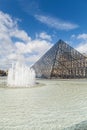 Louvre Museum with Glass Pyramids, Famous Landmark in Paris France Royalty Free Stock Photo
