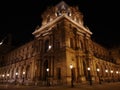 Louvre Museum at night in Paris, France Royalty Free Stock Photo