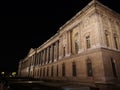 Louvre Museum at night in Paris, France Royalty Free Stock Photo