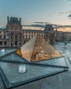 Louvre museum Paris france pyramid illuminated sunset Royalty Free Stock Photo