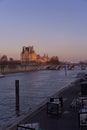 The Louvre museum in paris at sunset Royalty Free Stock Photo