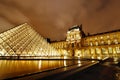 Louvre Museum and Pyramid night view, Paris, France Royalty Free Stock Photo