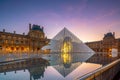 The Louvre Museum and Louvre Pyramid in Paris, France at sunrise Royalty Free Stock Photo