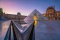 The Louvre Museum and Louvre Pyramid in Paris, France at sunrise Royalty Free Stock Photo