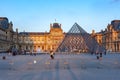 Louvre museum and pyramid at sunset, Paris, France