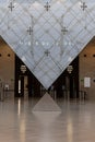 Paris, France - 02 23 2022: Louvre Museum. View of the inverted pyramid inside the alley of the Grand Louvre