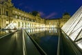 The Louvre Palace and the Pyramid which was completed in 1989, by night, Paris, France. Royalty Free Stock Photo