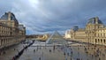 Louvre Palace and Pyramid Royalty Free Stock Photo