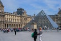 The Louvre Palace and the pyramid. Sightseeing tour around Paris. Royalty Free Stock Photo