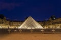 The Louvre Palace and the Pyramid which was completed in 1989, by night, Paris, France. Royalty Free Stock Photo