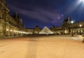 The Louvre Palace and the Pyramid which was completed in 1989, by night, Paris, France. Royalty Free Stock Photo