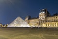 Louvre palace and pyramids at night, Paris, France