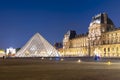 Louvre palace and pyramids at night, Paris, France