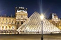 Louvre palace and pyramids at night, Paris, France