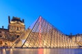 The Louvre Pyramid at dusk during the Michelangelo Pistoletto Ex