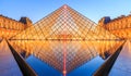 The Louvre Pyramid at dusk during the Michelangelo Pistoletto Ex