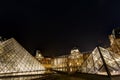 Louvre pyramid museum in Paris at night light, Musee du Louvre. Royalty Free Stock Photo