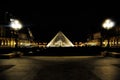 Louvre pyramid by night, Paris, France. Royalty Free Stock Photo
