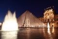 Louvre Pyramid and Pavillon Rishelieu in evening Royalty Free Stock Photo