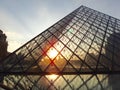 Louvre Pyramid during a sunset in Paris Royalty Free Stock Photo