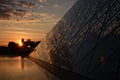 Louvre Pyramid at sunset Royalty Free Stock Photo