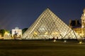 Louvre pyramids at night in Paris, France Royalty Free Stock Photo