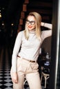 Lovable woman in cute glasses.Close up fashion street stile portrait.wearing cute trendy outfit