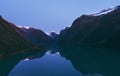 Lovatnet lake and mountains night landscape in Norway aerial view