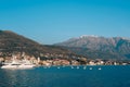 Lovcen in the snow. Snow on the mountain. View from Tivat. Water Royalty Free Stock Photo