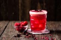 Love Affair cocktail alongside with fresh berry fruit