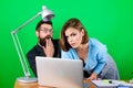 Love affair at work. Seduction. business couple at computer. woman and man work in office at laptop. secretary with boss Royalty Free Stock Photo