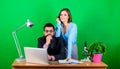 Love affair at work. Seduction. businessman and assistant solve problem. woman and man work in office at laptop Royalty Free Stock Photo