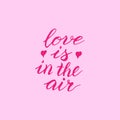 Love is in the air pink card. Greeting Valentine`s day typography lettering. Romantic quote, love celebration font words. Postcar Royalty Free Stock Photo