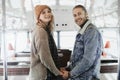 Happy beloved couple holding hands in bus cafe Royalty Free Stock Photo