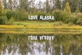 Love Alaska sign along the river Royalty Free Stock Photo