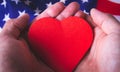 Love for America. Heart on the background of the USA flag. Royalty Free Stock Photo